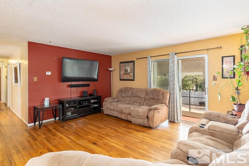 3450 Bryan Street Reno, NV 89503 - Photo 7 of 18 a living room with furniture and a flat screen tv