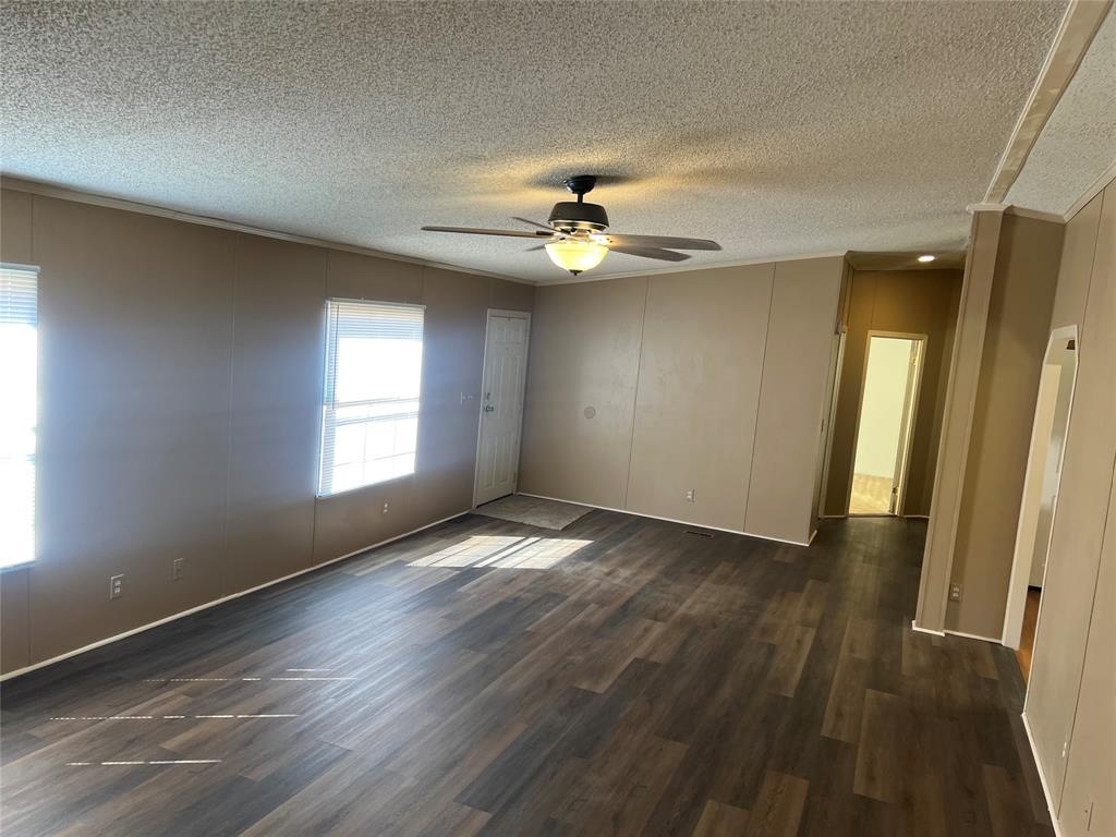 368 Fox Creek Haughton, LA 71037 - Photo 3 of 24 an empty room with wooden floor and windows