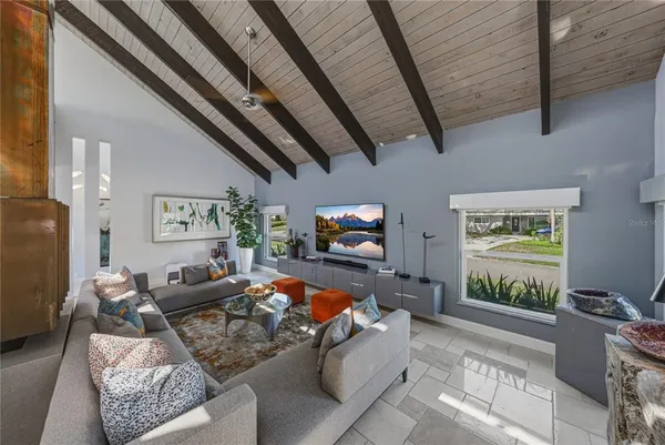 a bedroom with a bed and a table in it