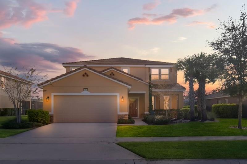 4147 Oak Tree Drive Davenport, FL 33837 - Photo 1 of 1 a front view of a house with a yard