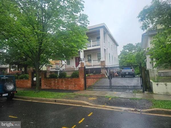 a view of a house with a back yard