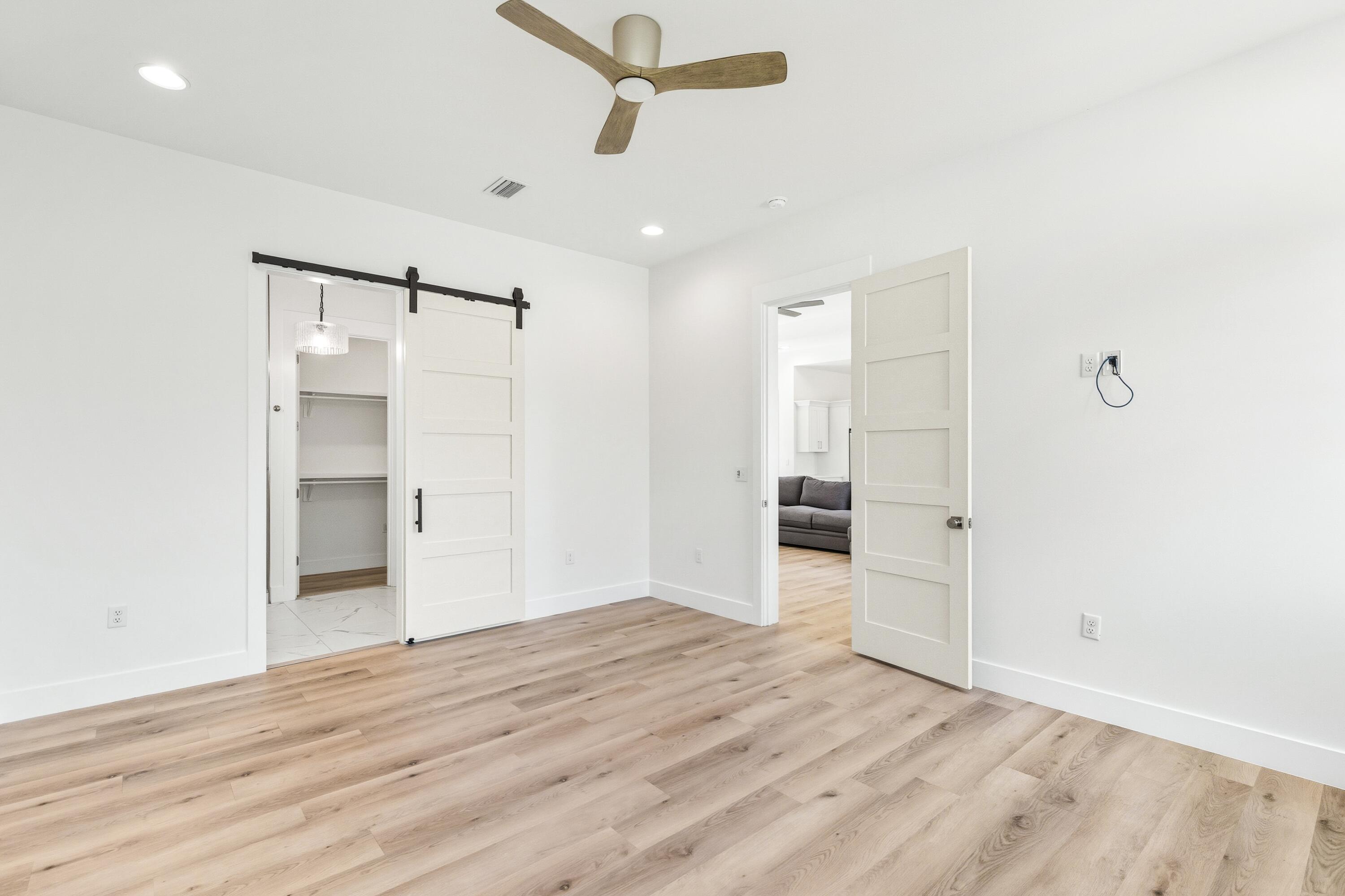 219 Loral Road Santa Rosa Beach, FL 32459 - Photo 14 of 26 a view of empty room with wooden floor