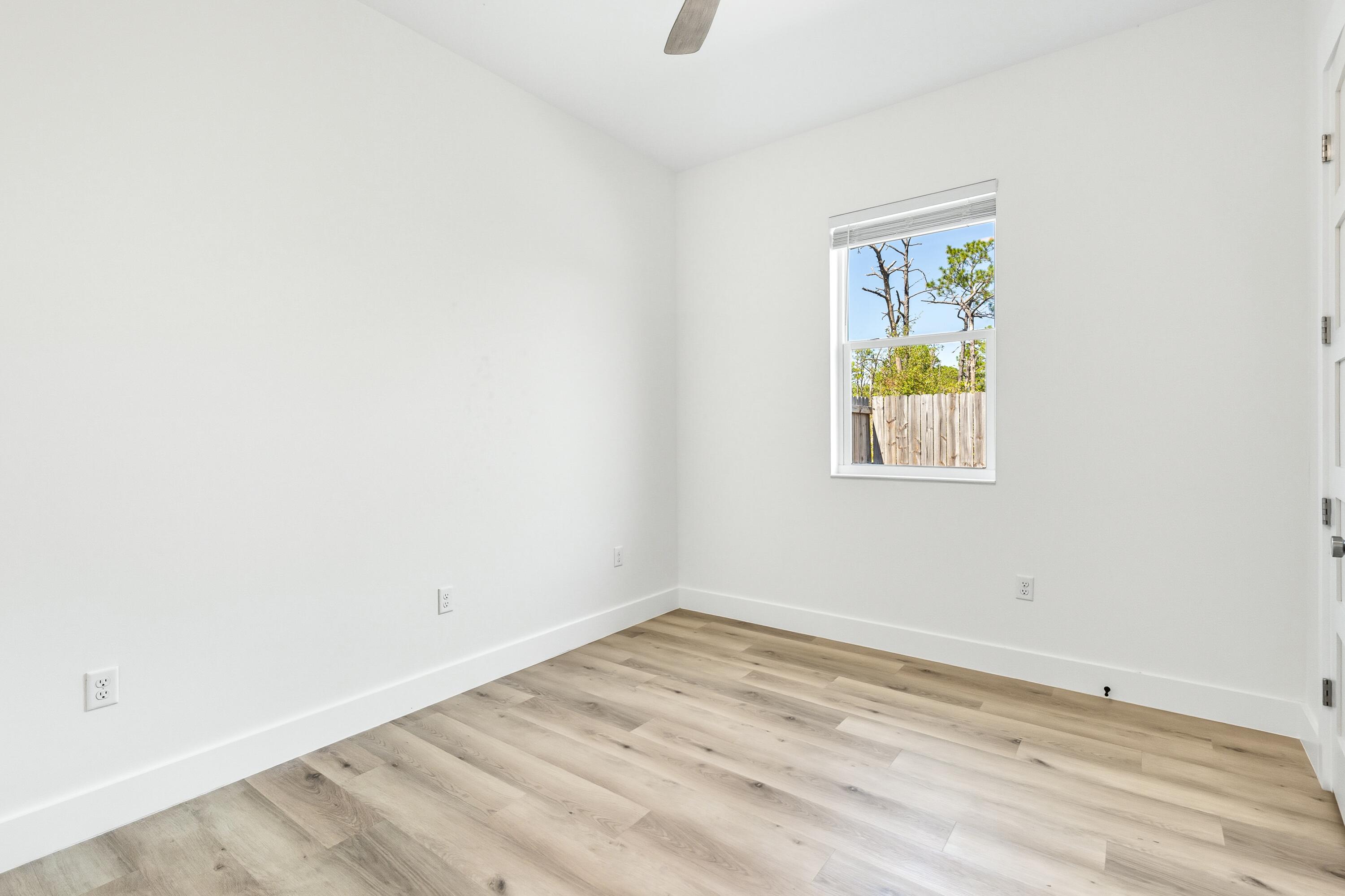 219 Loral Road Santa Rosa Beach, FL 32459 - Photo 19 of 26 an empty room with window