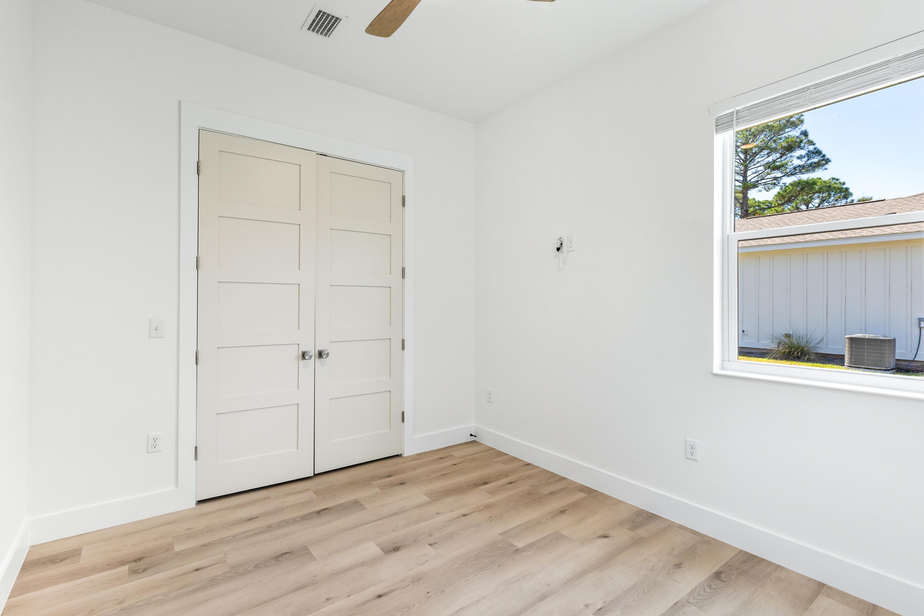 219 Loral Road Santa Rosa Beach, FL 32459 - Photo 21 of 26 a view of a room that has a window in it
