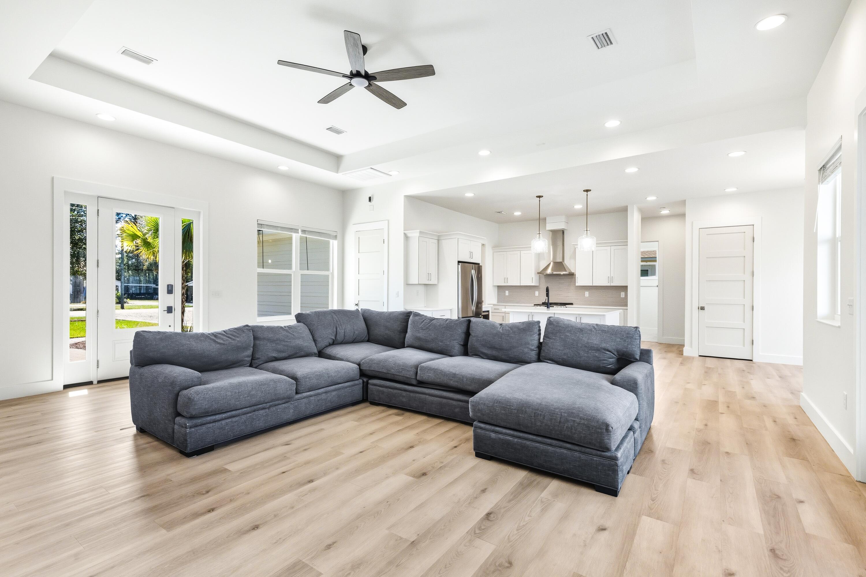219 Loral Road Santa Rosa Beach, FL 32459 - Photo 6 of 26 a living room with furniture and a wooden floor