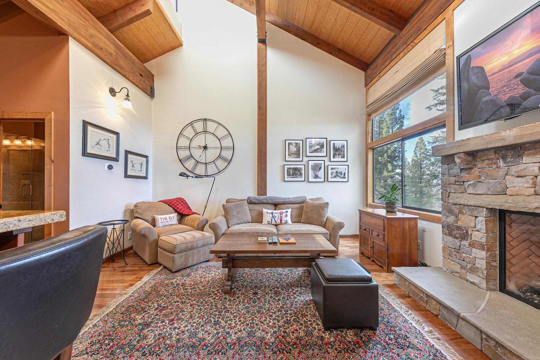 6108 Rocky Point Northstar, CA 96161 - Photo 1 of 28 a living room with furniture and a fireplace