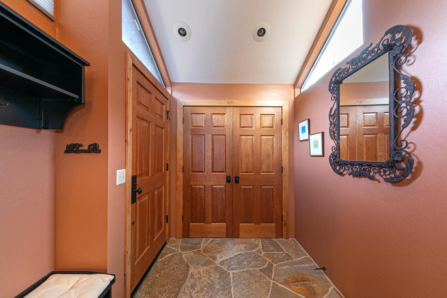 6108 Rocky Point Northstar, CA 96161 - Photo 12 of 28 a view of a hallway with wooden floor and staircase