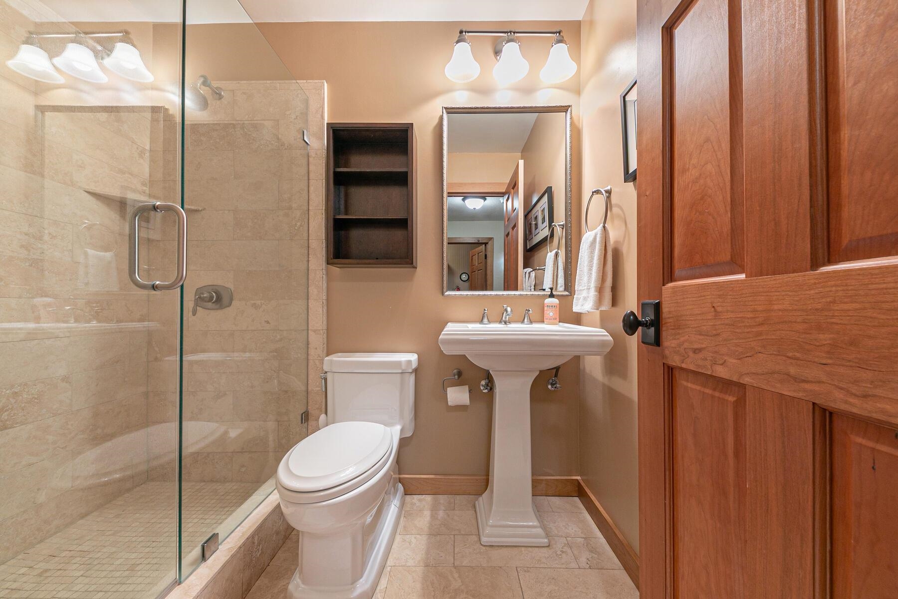6108 Rocky Point Northstar, CA 96161 - Photo 13 of 28 a bathroom with a toilet a sink and shower