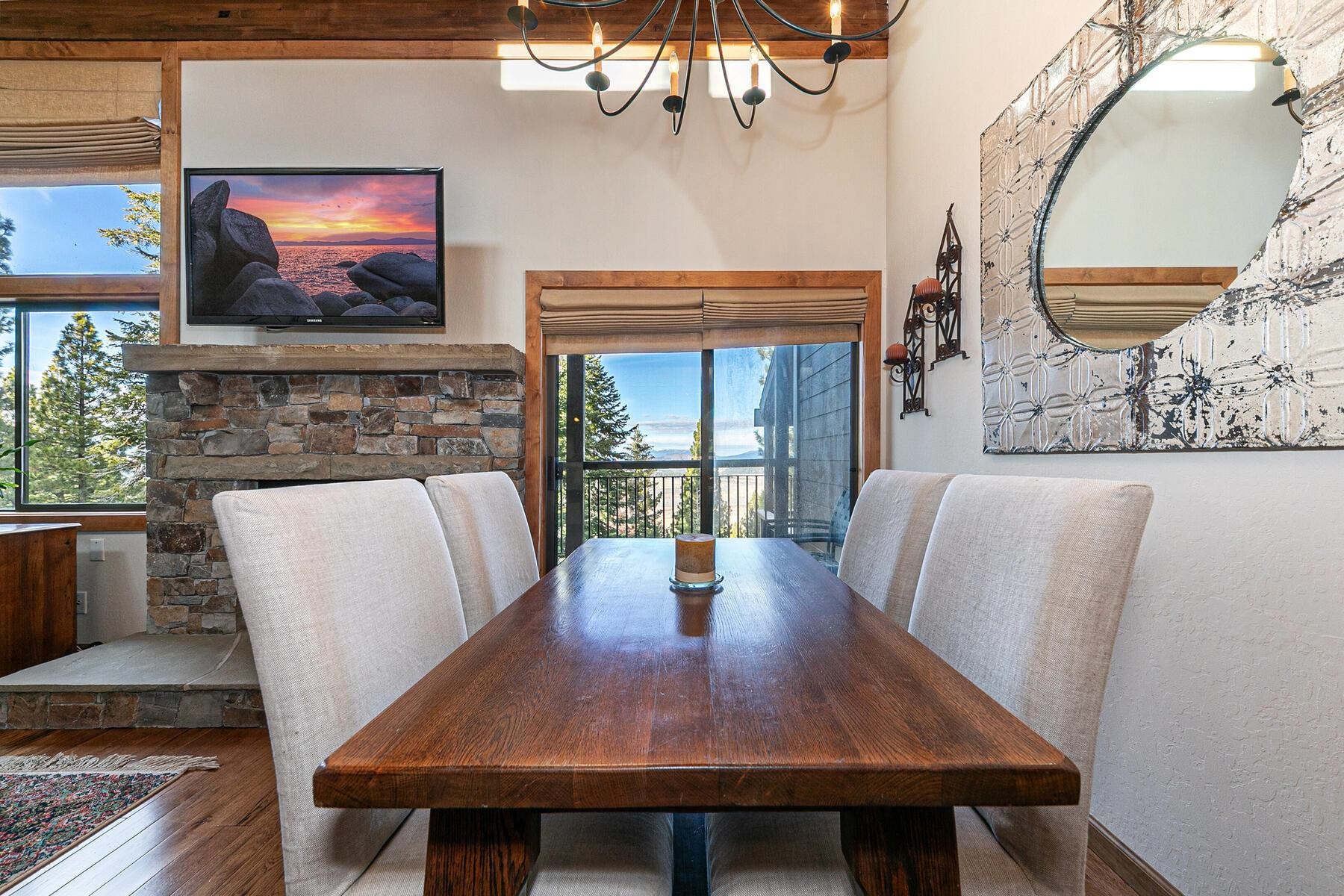 6108 Rocky Point Northstar, CA 96161 - Photo 5 of 28 a view of a dining room with furniture wooden floor and chandelier