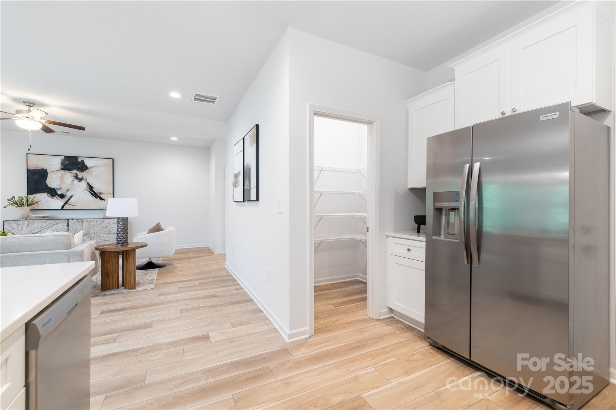 1418 Summerville Road Charlotte, NC 28214 - Photo 12 of 30 a kitchen with stainless steel appliances a refrigerator and a sink