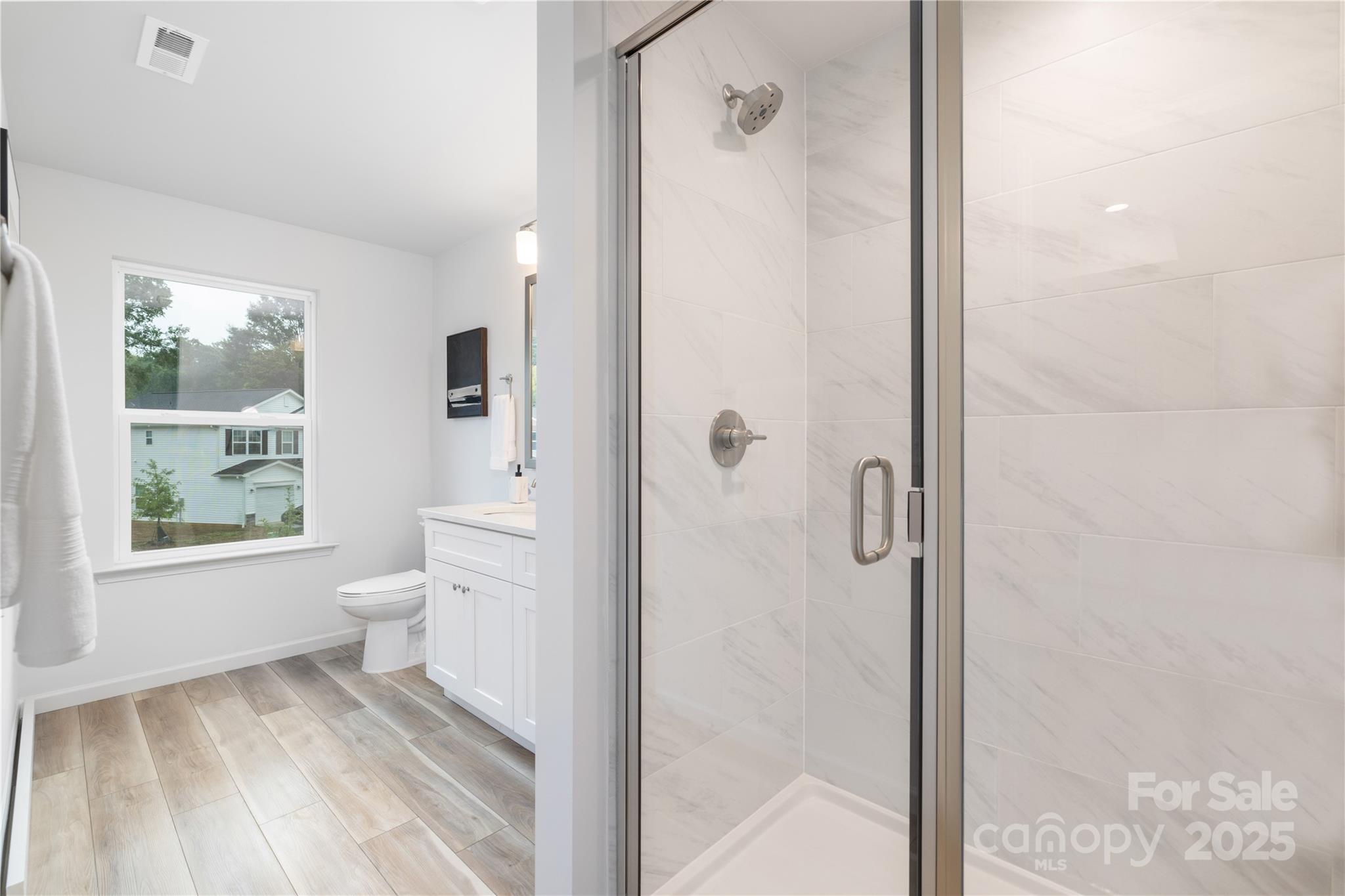 1418 Summerville Road Charlotte, NC 28214 - Photo 24 of 30 a bathroom that has a toilet in it