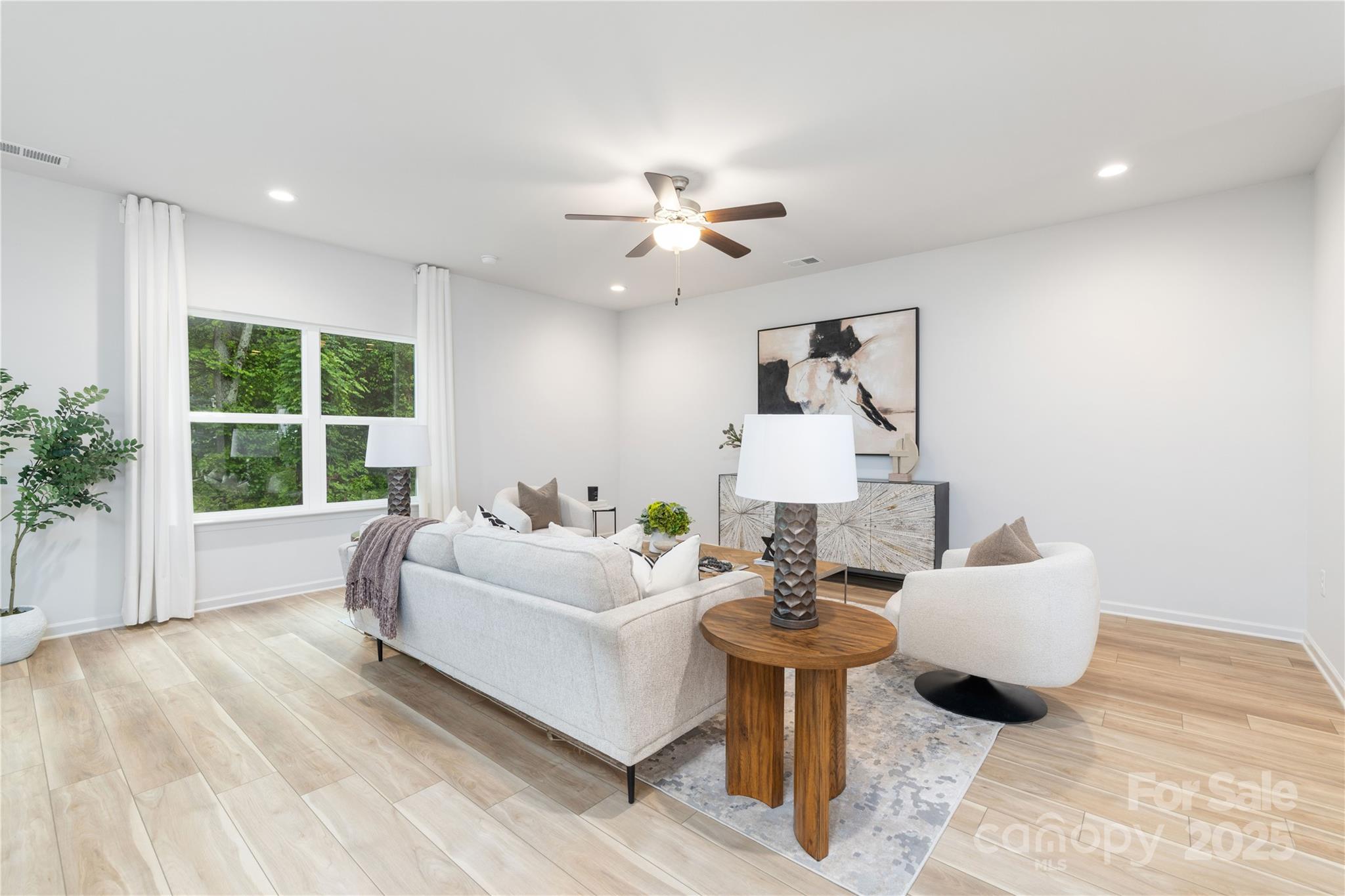 1418 Summerville Road Charlotte, NC 28214 - Photo 5 of 30 a living room with furniture and a large window