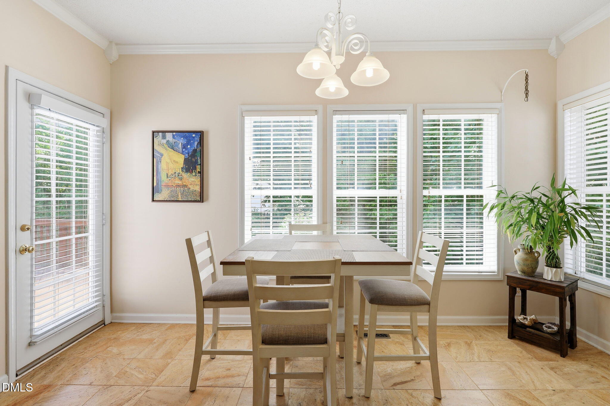 9105 Willow Valley Court Raleigh, NC 27617 - Photo 9 of 51 a view of a dining room with furniture window and outside view