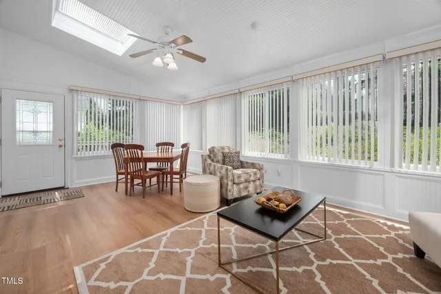 a living room with furniture and window