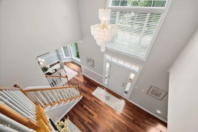 a view of staircase with white walls