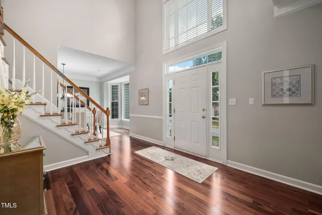 a view of entryway with wooden floor