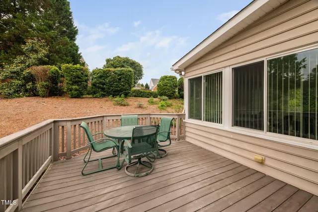 a view of outdoor sitting area with furniture