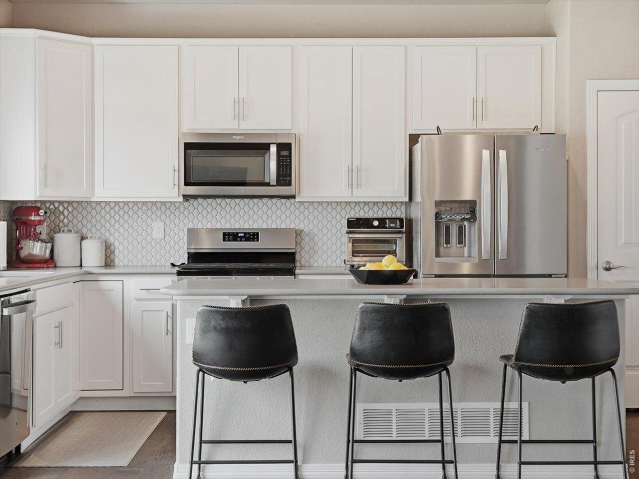 1766 Ruddlesway Drive Windsor, CO 80550 - Photo 11 of 50 White Kitchen Cabinets
