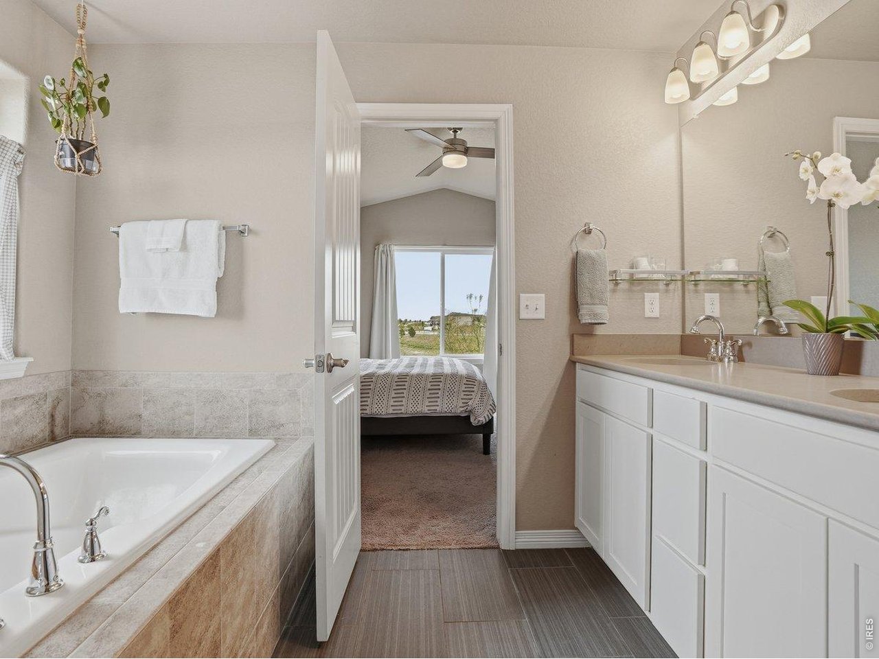 1766 Ruddlesway Drive Windsor, CO 80550 - Photo 20 of 50 Primary Soaking Tub and Double Sinks