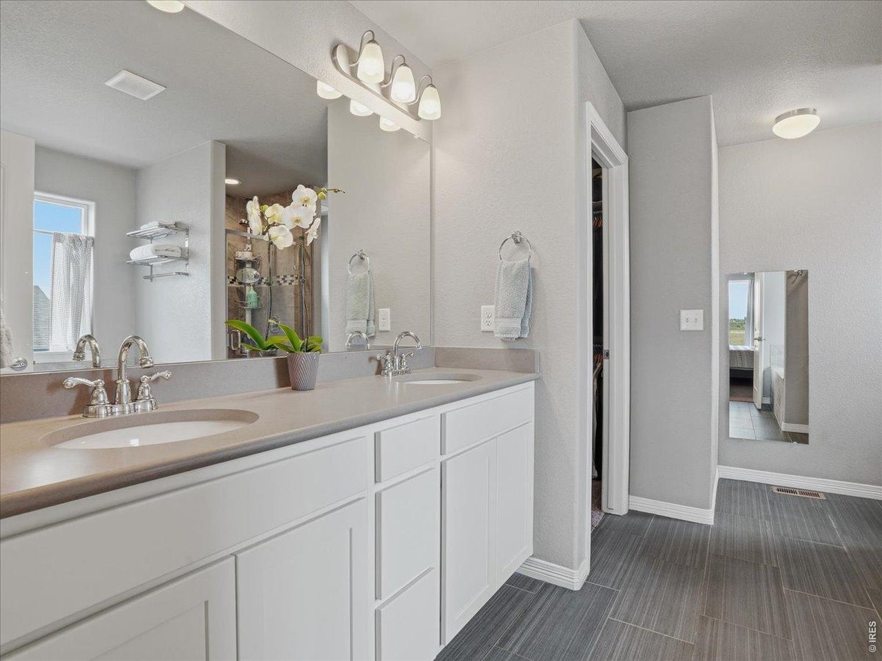 1766 Ruddlesway Drive Windsor, CO 80550 - Photo 21 of 50 Double Sinks in Primary En Suite