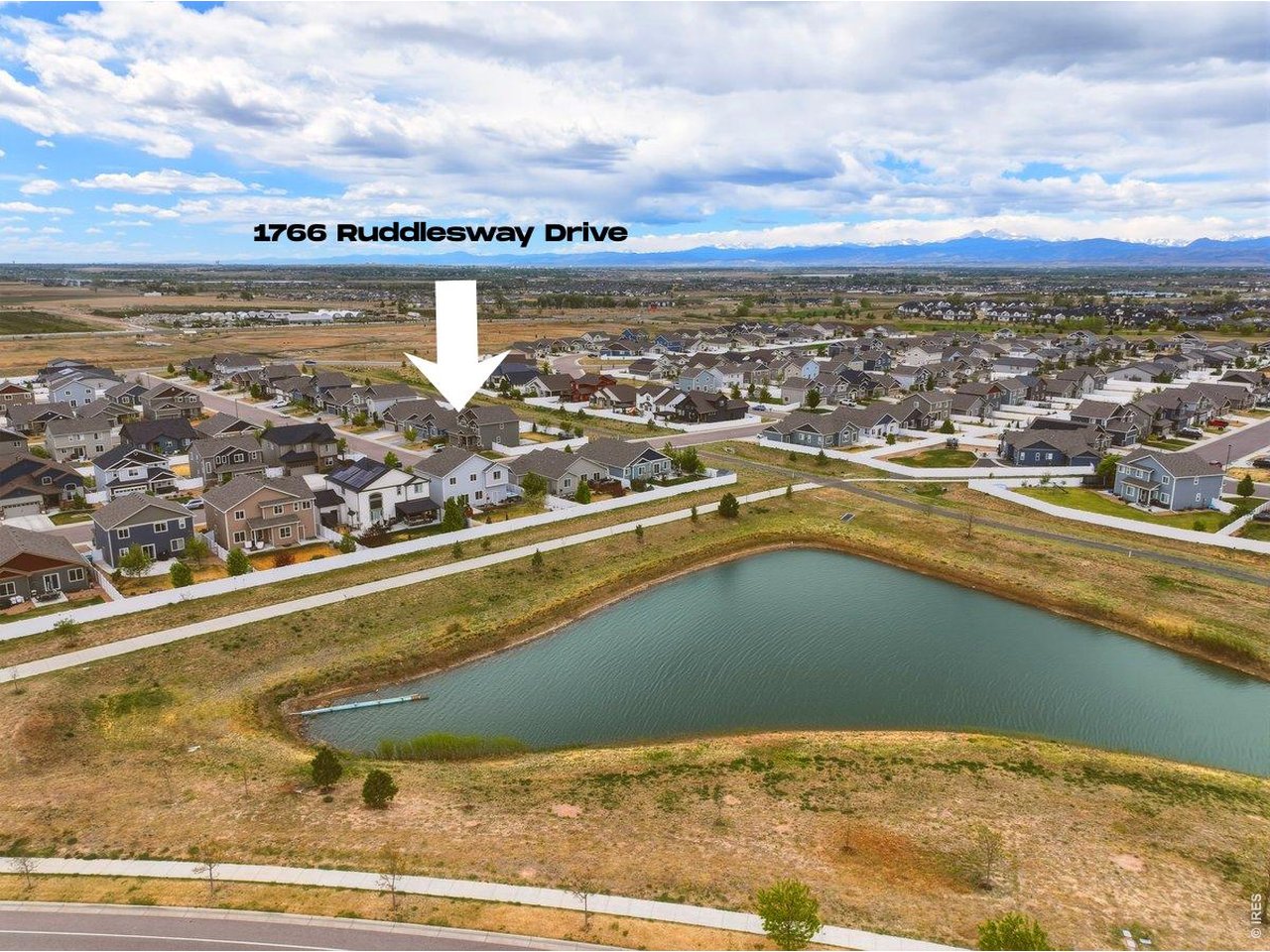 1766 Ruddlesway Drive Windsor, CO 80550 - Photo 40 of 50 Aerial View With Open Space and Retention Pond Behind Property
