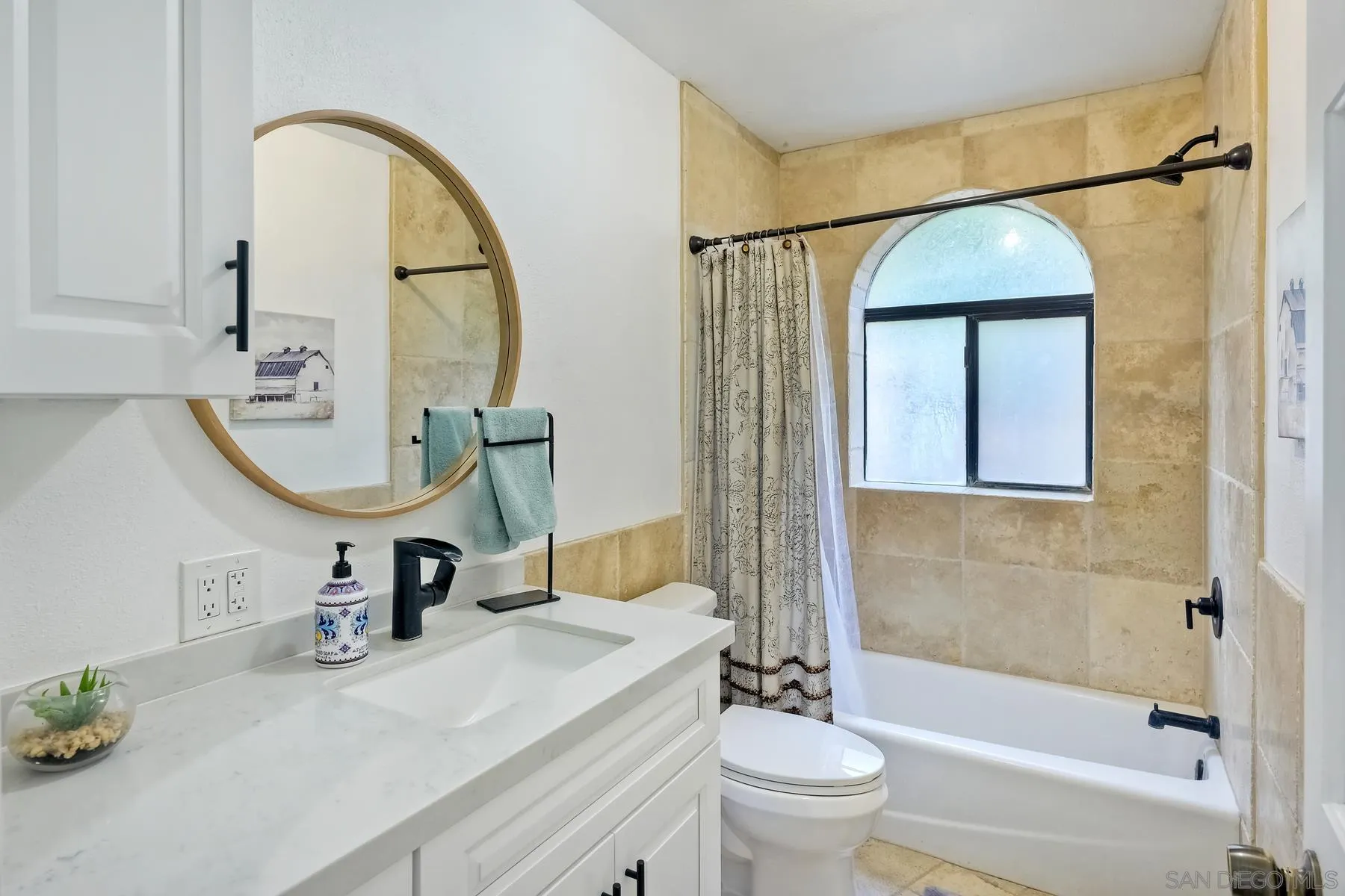 20570 Sycamore Springs Road Jamul, CA 91935 - Photo 14 of 39 a bathroom with a sink a toilet and a mirror
