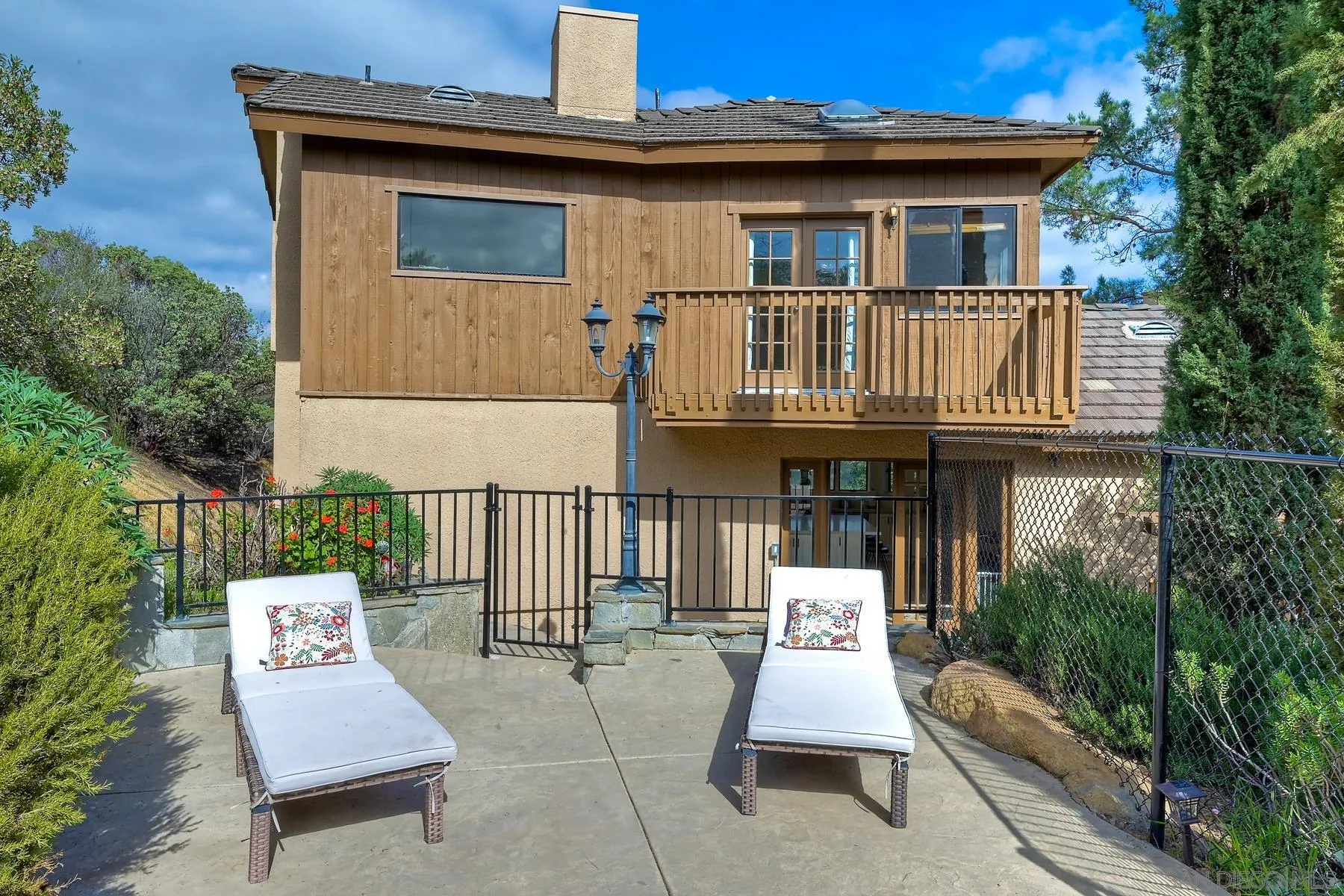 20570 Sycamore Springs Road Jamul, CA 91935 - Photo 31 of 39 a front view of a house with a patio