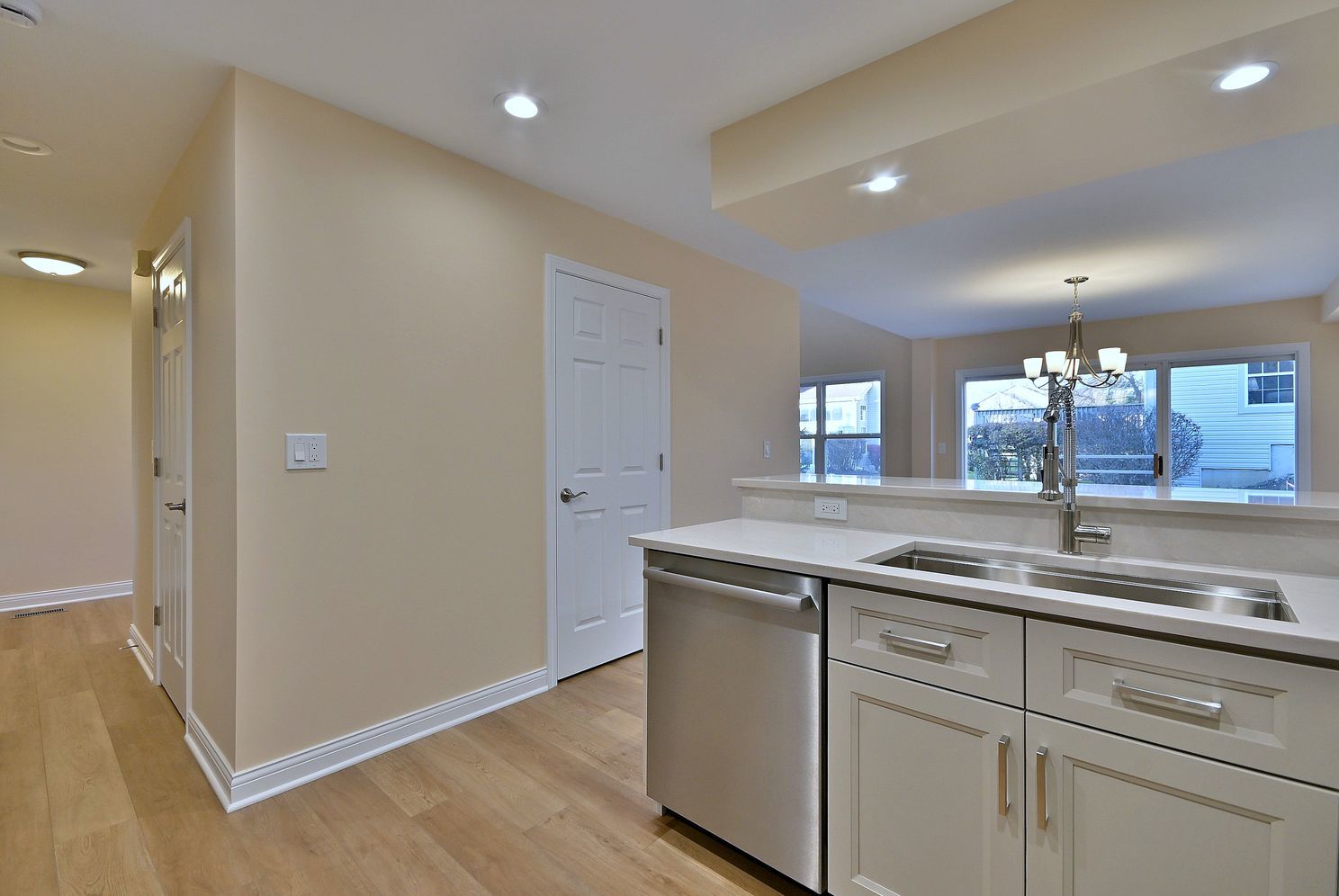 3208 Raphael Court St. Charles, IL 60175 - Photo 18 of 47 a kitchen with a sink and mirror