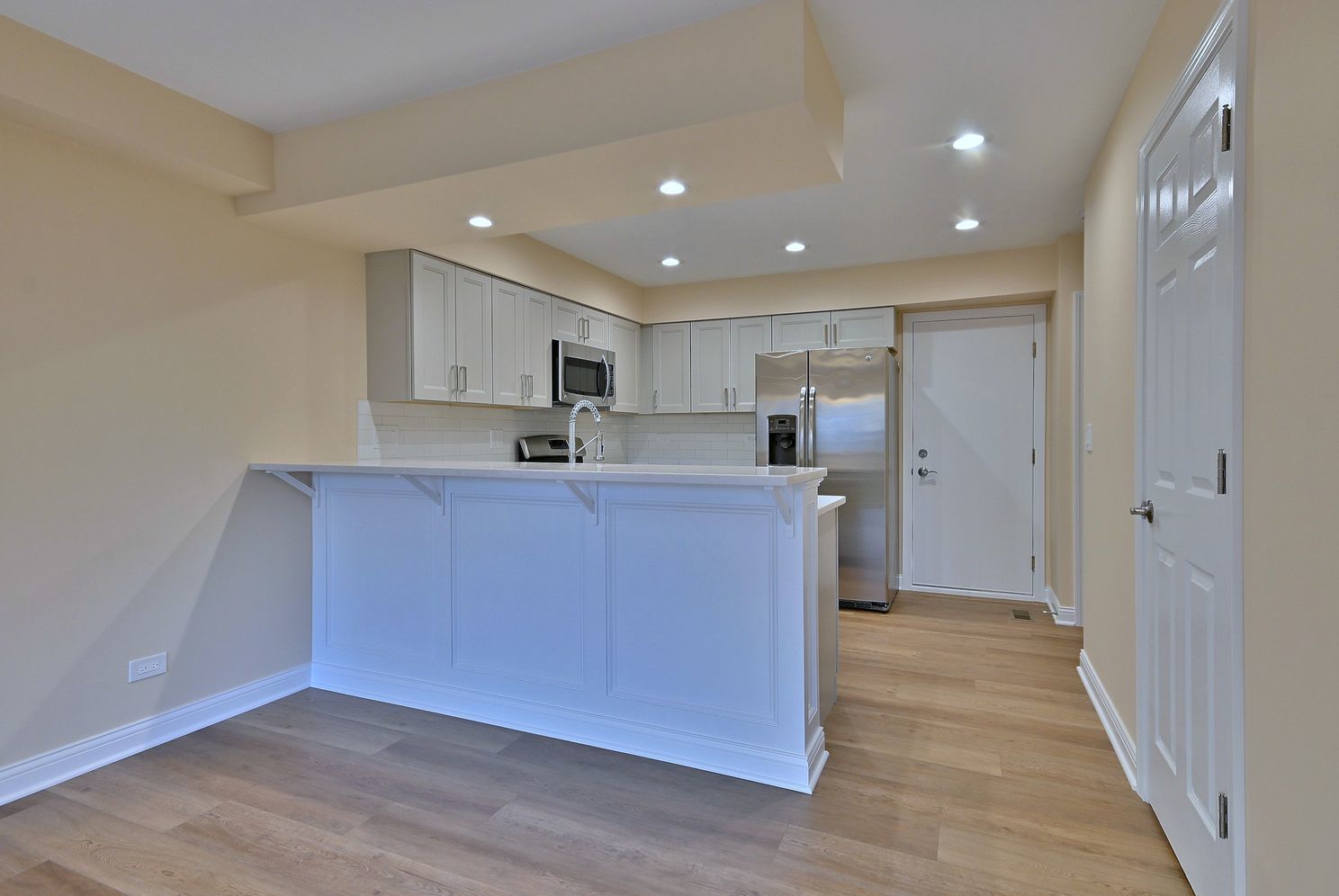 3208 Raphael Court St. Charles, IL 60175 - Photo 20 of 47 a kitchen with stainless steel appliances granite countertop a refrigerator a sink a stove and a oven