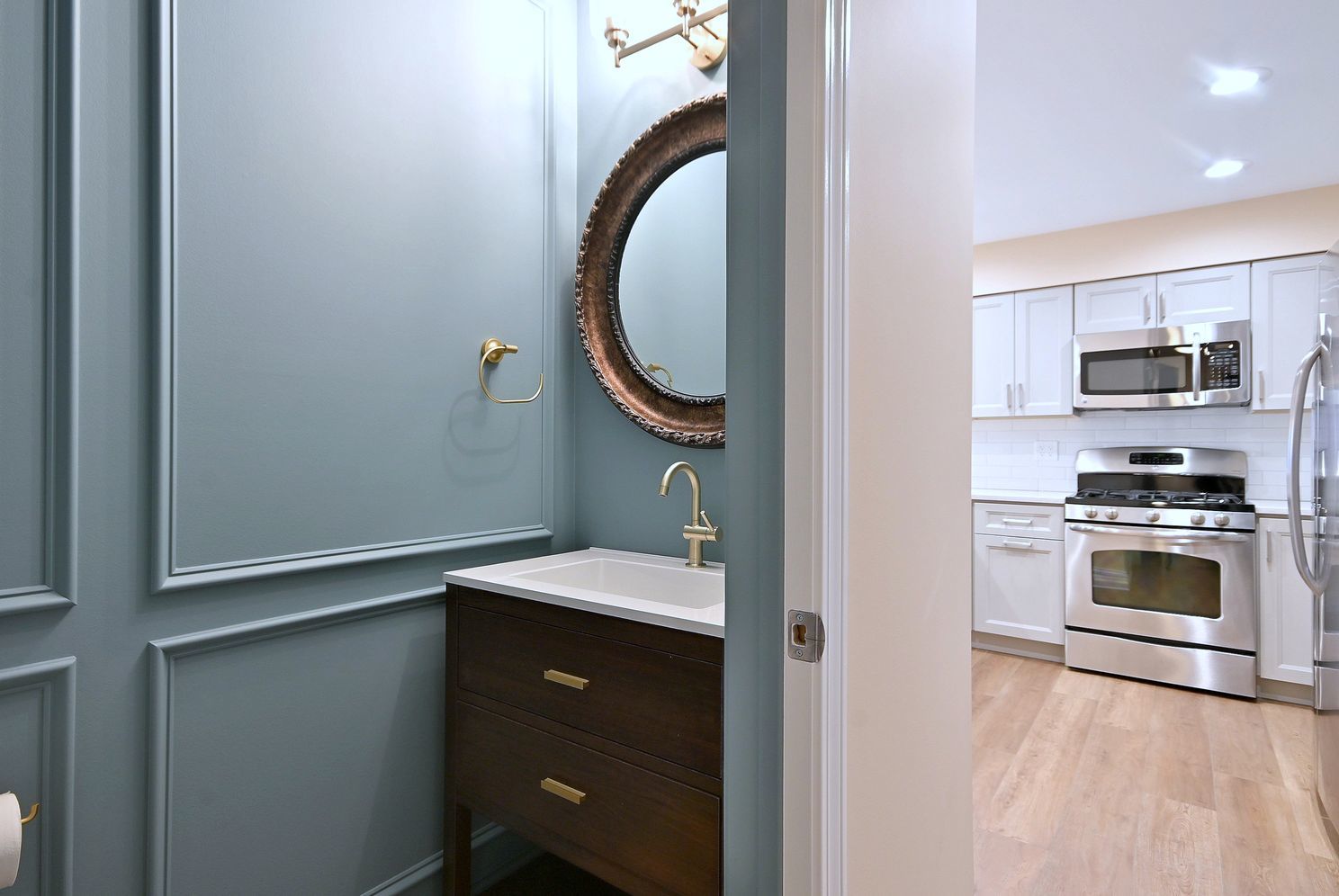 3208 Raphael Court St. Charles, IL 60175 - Photo 22 of 47 a kitchen with a sink and a stove
