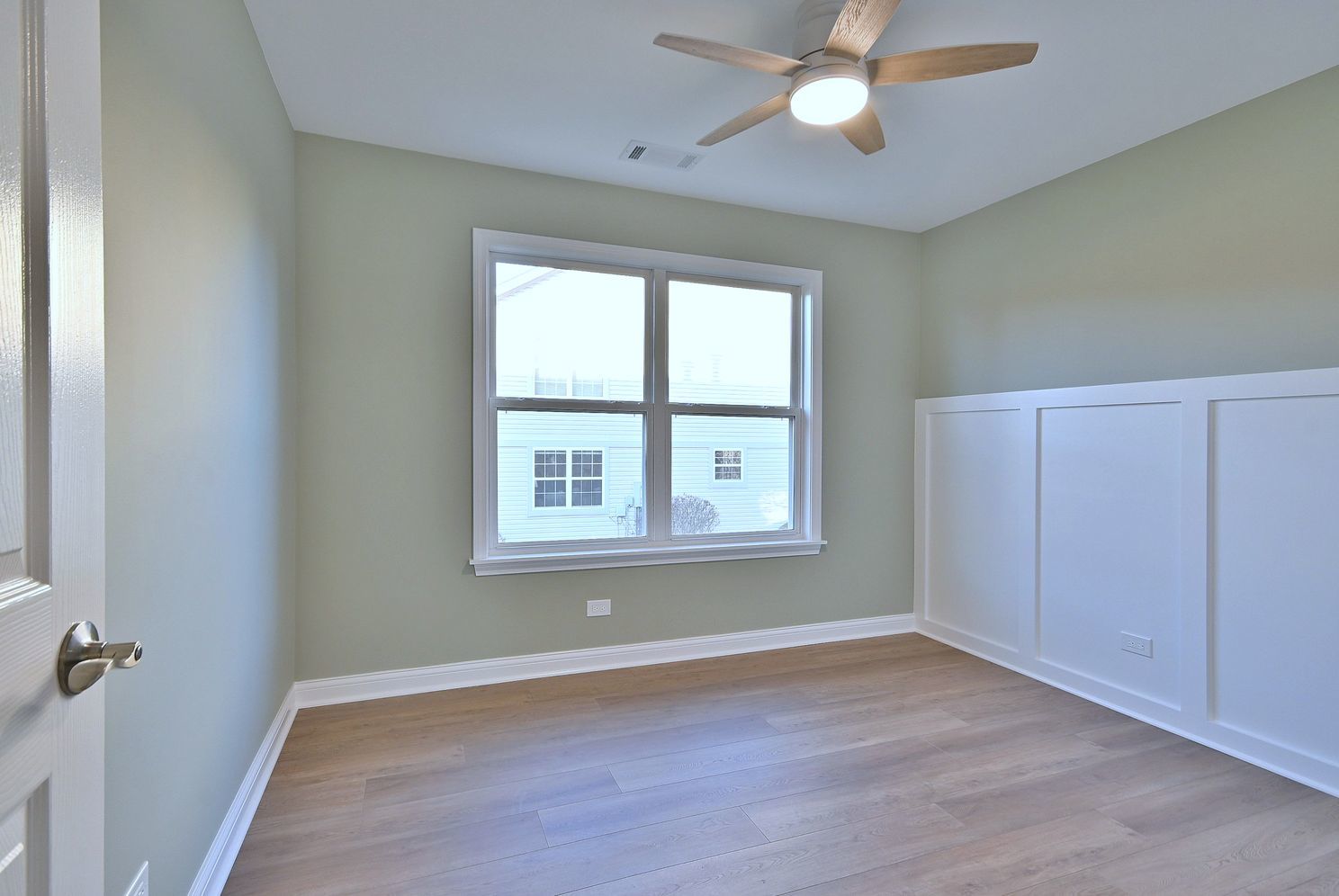 3208 Raphael Court St. Charles, IL 60175 - Photo 41 of 47 wooden floor in an empty room with a window