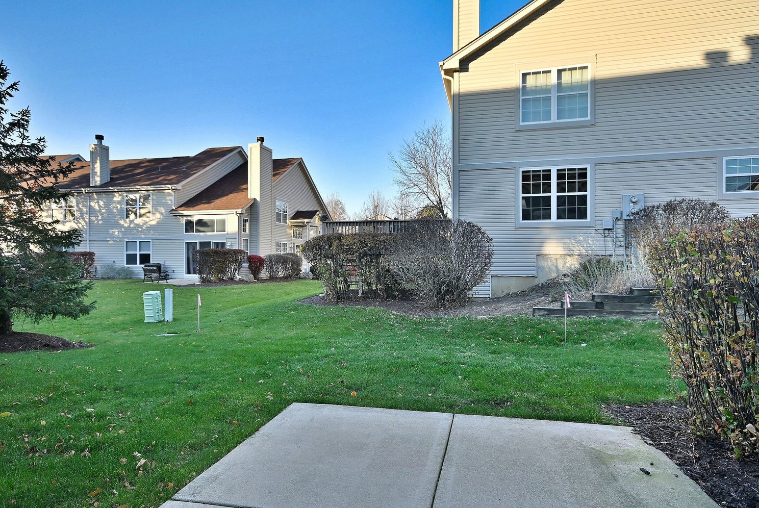 3208 Raphael Court St. Charles, IL 60175 - Photo 6 of 47 a front view of a house with a garden