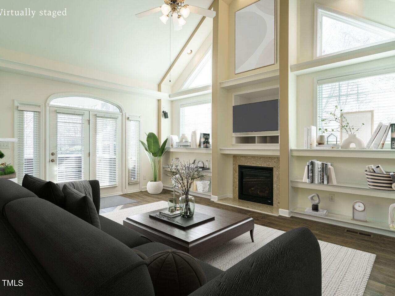 600 Competition Road Raleigh, NC 27603 - Photo 1 of 42 a living room with furniture fireplace and flat screen tv