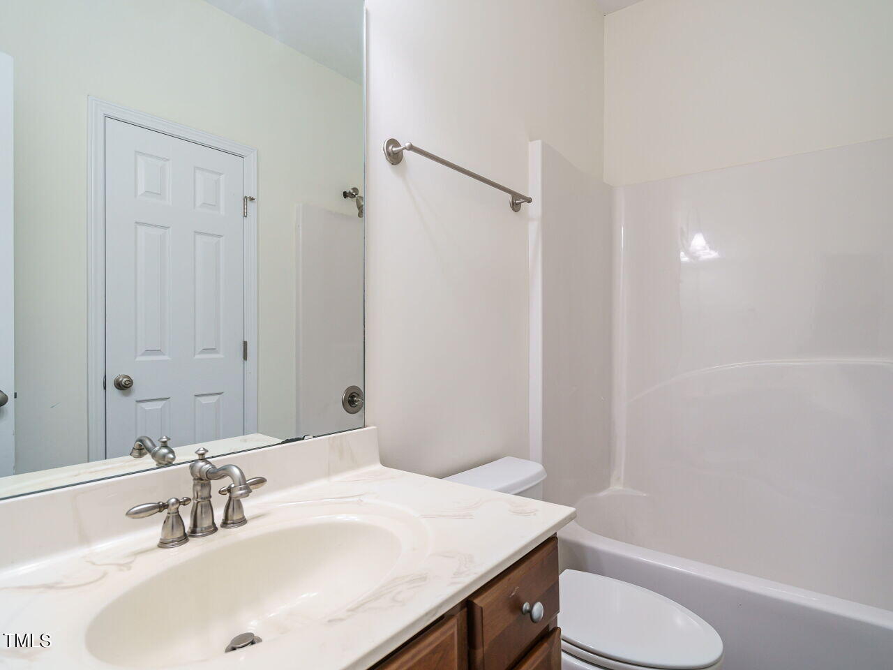 600 Competition Road Raleigh, NC 27603 - Photo 23 of 42 a bathroom with a sink toilet and shower
