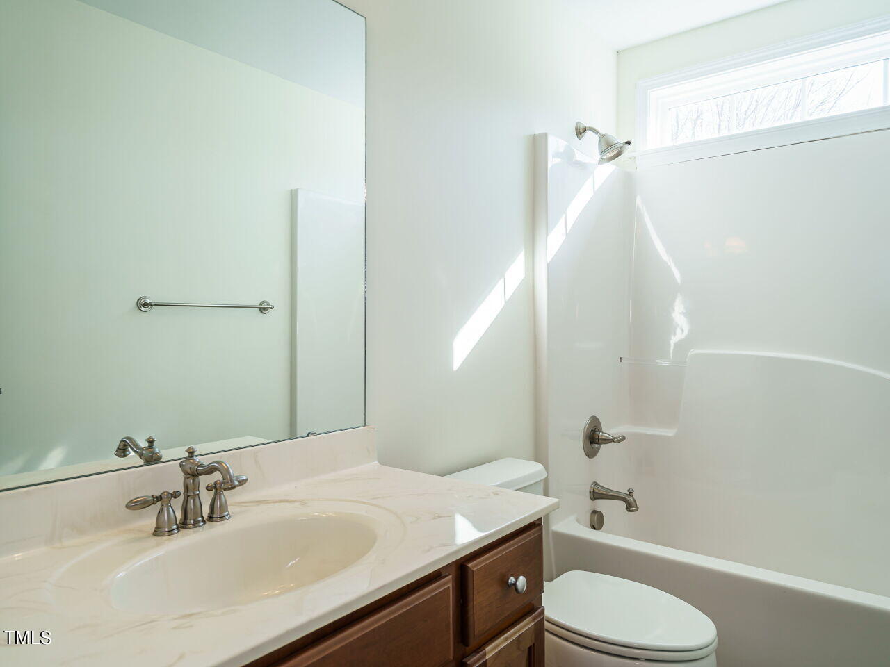 600 Competition Road Raleigh, NC 27603 - Photo 28 of 42 a bathroom with a sink toilet and shower