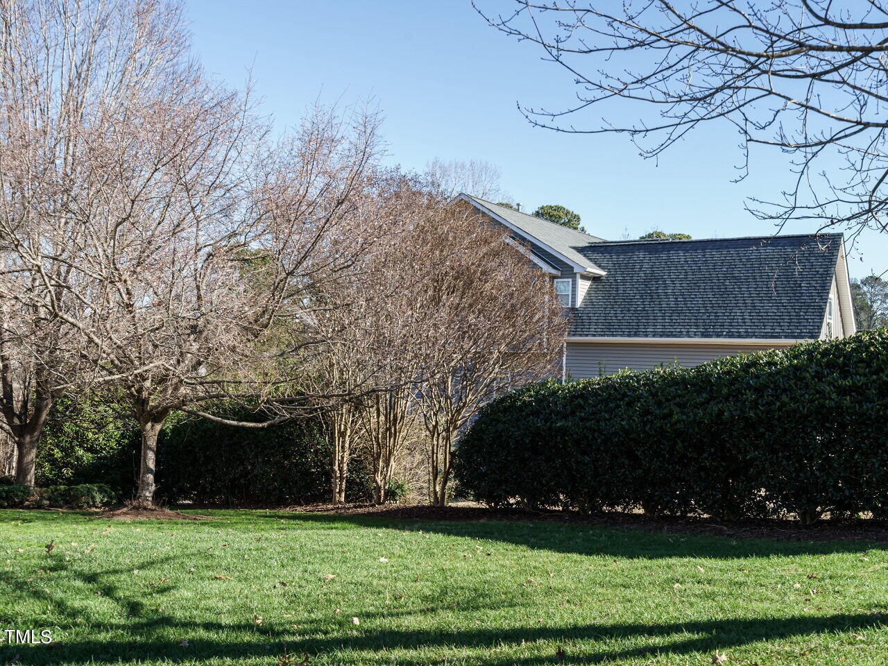 600 Competition Road Raleigh, NC 27603 - Photo 33 of 42 a front view of a house with a garden