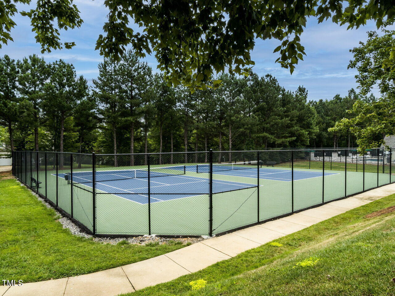 600 Competition Road Raleigh, NC 27603 - Photo 37 of 42 a view of a backyard with swimming pool and small garden