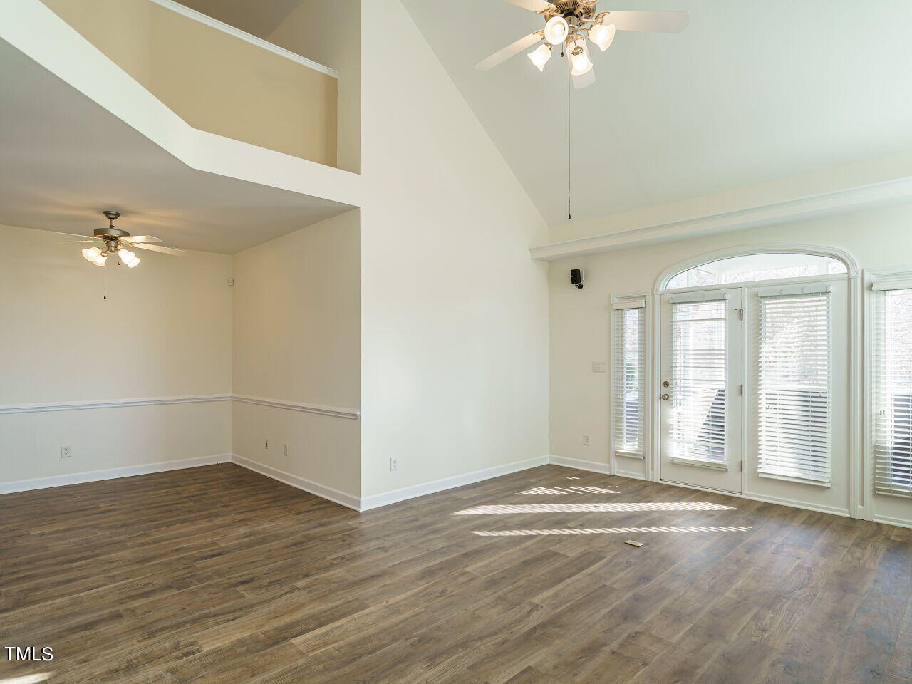600 Competition Road Raleigh, NC 27603 - Photo 9 of 42 wooden floor in an empty room with a window