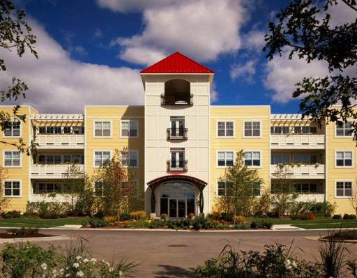 970 Harris Road, Unit 222 Grayslake, IL 60030 - Photo 1 of 11 a front view of a building with street view