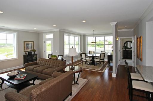 970 Harris Road, Unit 222 Grayslake, IL 60030 - Photo 2 of 11 a living room with furniture and wooden floor