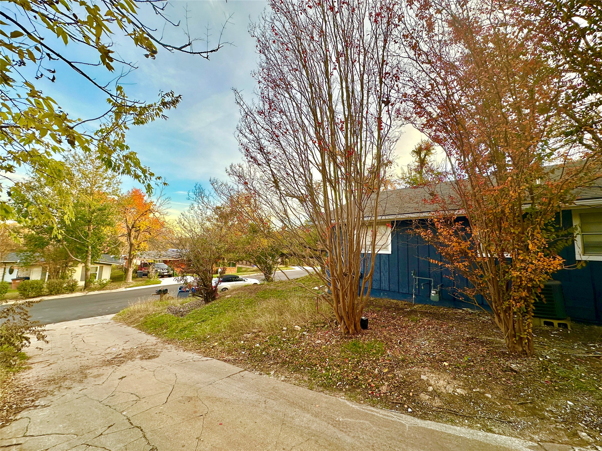 4302 Scottsdale Road, Unit A Austin, TX 78721 - Photo 2 of 30 a view of a yard with plants and trees