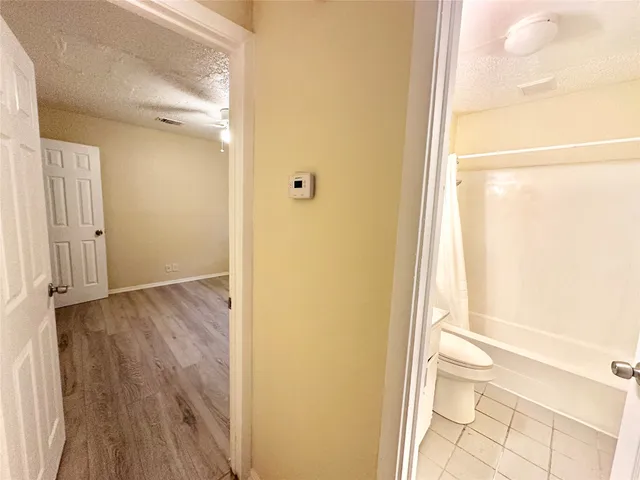 a view of bathroom with a toilet