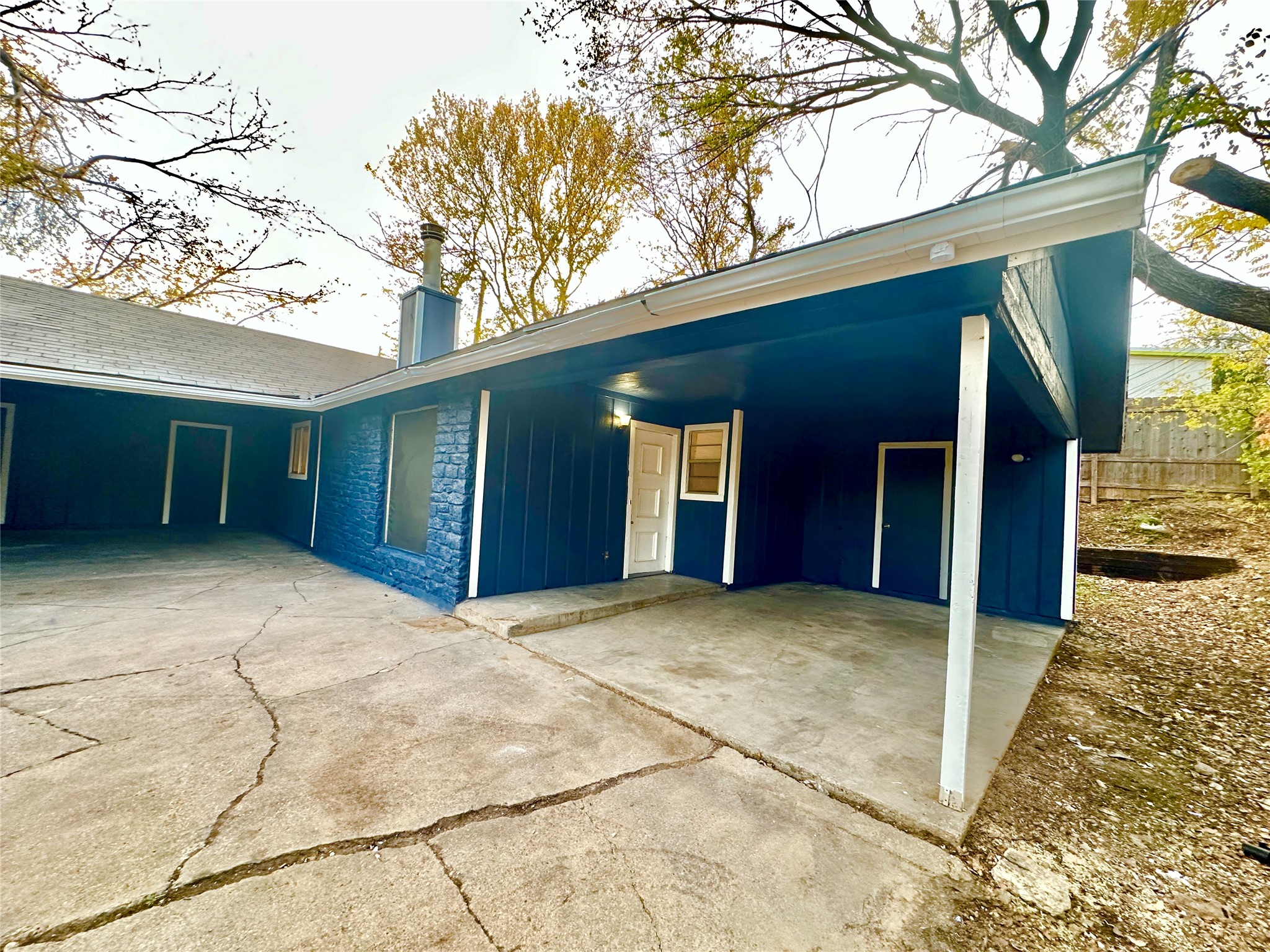4302 Scottsdale Road, Unit A Austin, TX 78721 - Photo 4 of 30 a view of house with yard and large tree