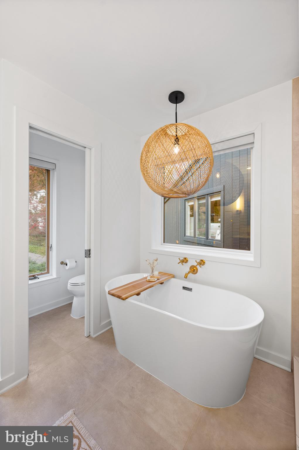 309 Valley Place Radnor, PA 19087 - Photo 17 of 29 a spacious bathroom with a bathtub and sink