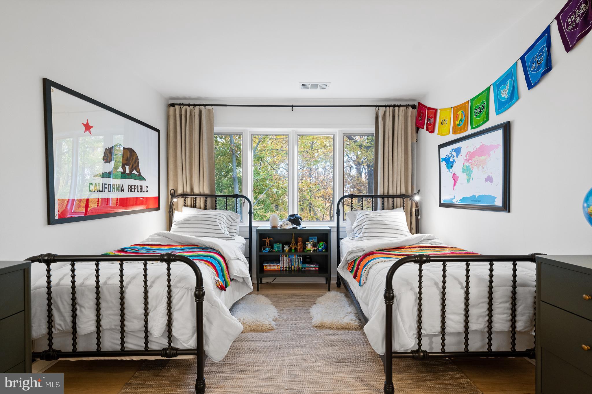 309 Valley Place Radnor, PA 19087 - Photo 18 of 29 a bedroom with three beds and a large window