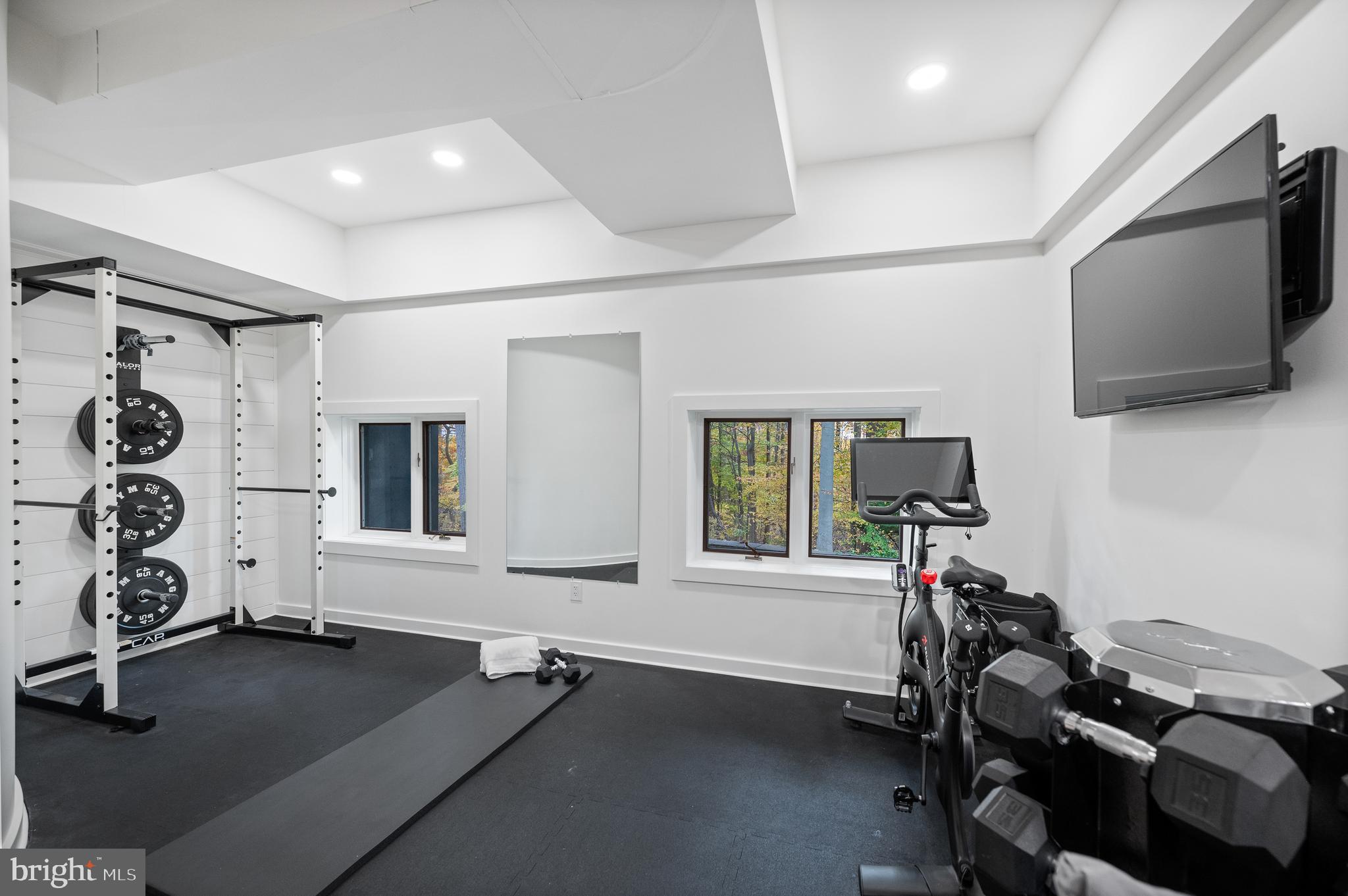 309 Valley Place Radnor, PA 19087 - Photo 27 of 29 a room with gym equipment and a flat screen tv