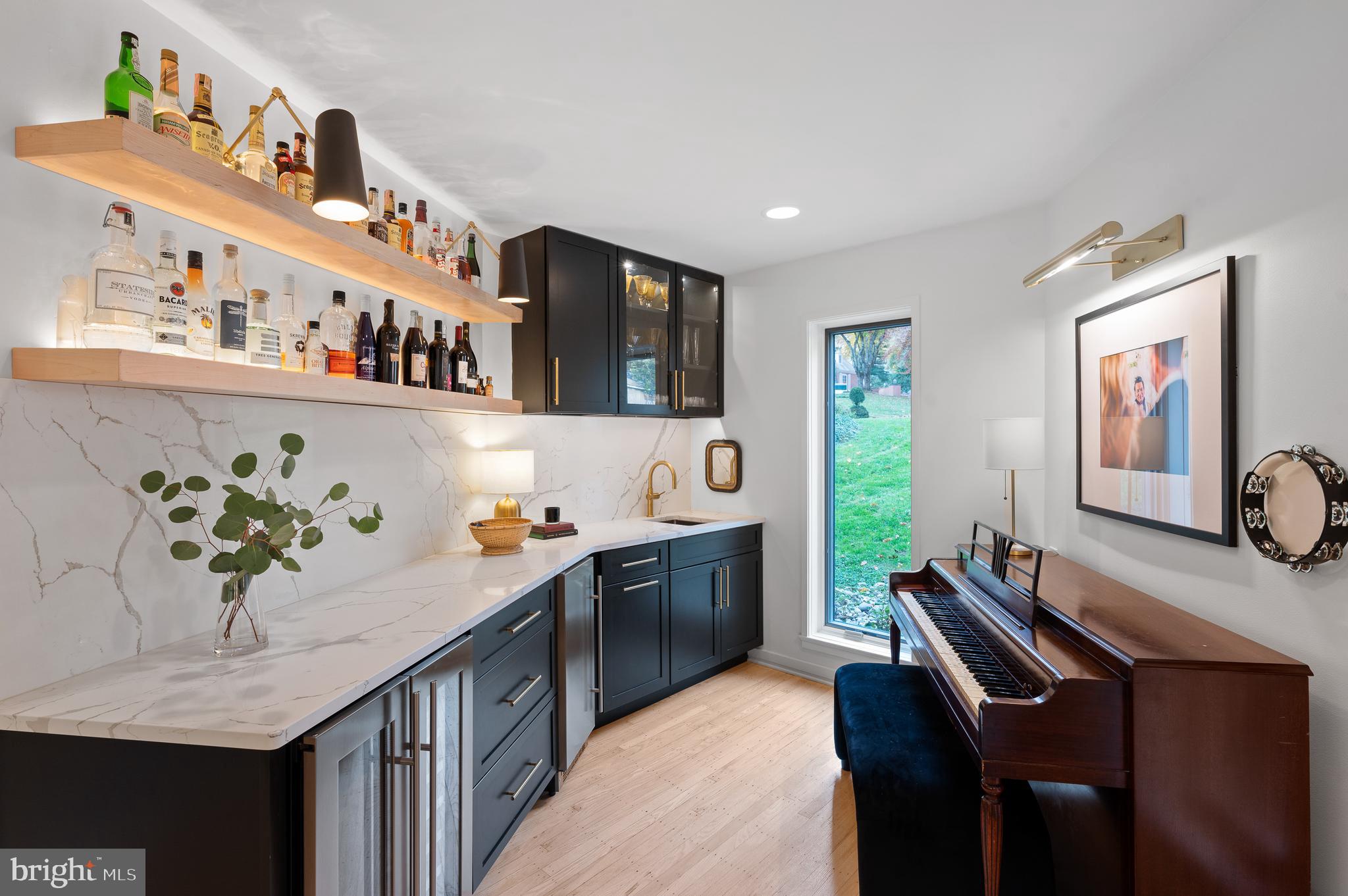 309 Valley Place Radnor, PA 19087 - Photo 5 of 29 a kitchen with stainless steel appliances granite countertop a sink and a refrigerator