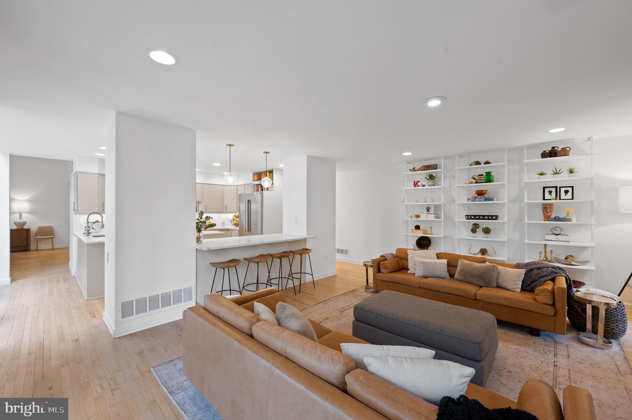 309 Valley Place Radnor, PA 19087 - Photo 7 of 29 a living room with furniture and a wooden floor