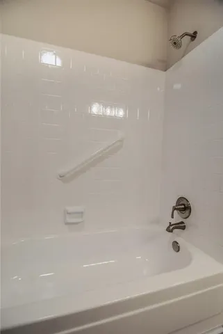 a bathroom with a bathtub
