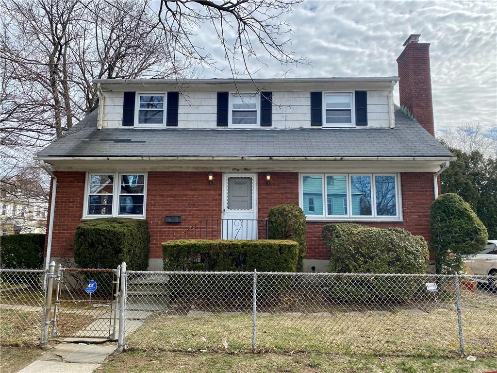 61 Madeleine Avenue New Rochelle, NY 10801 - Photo 1 of 1 a front view of a house with a garden